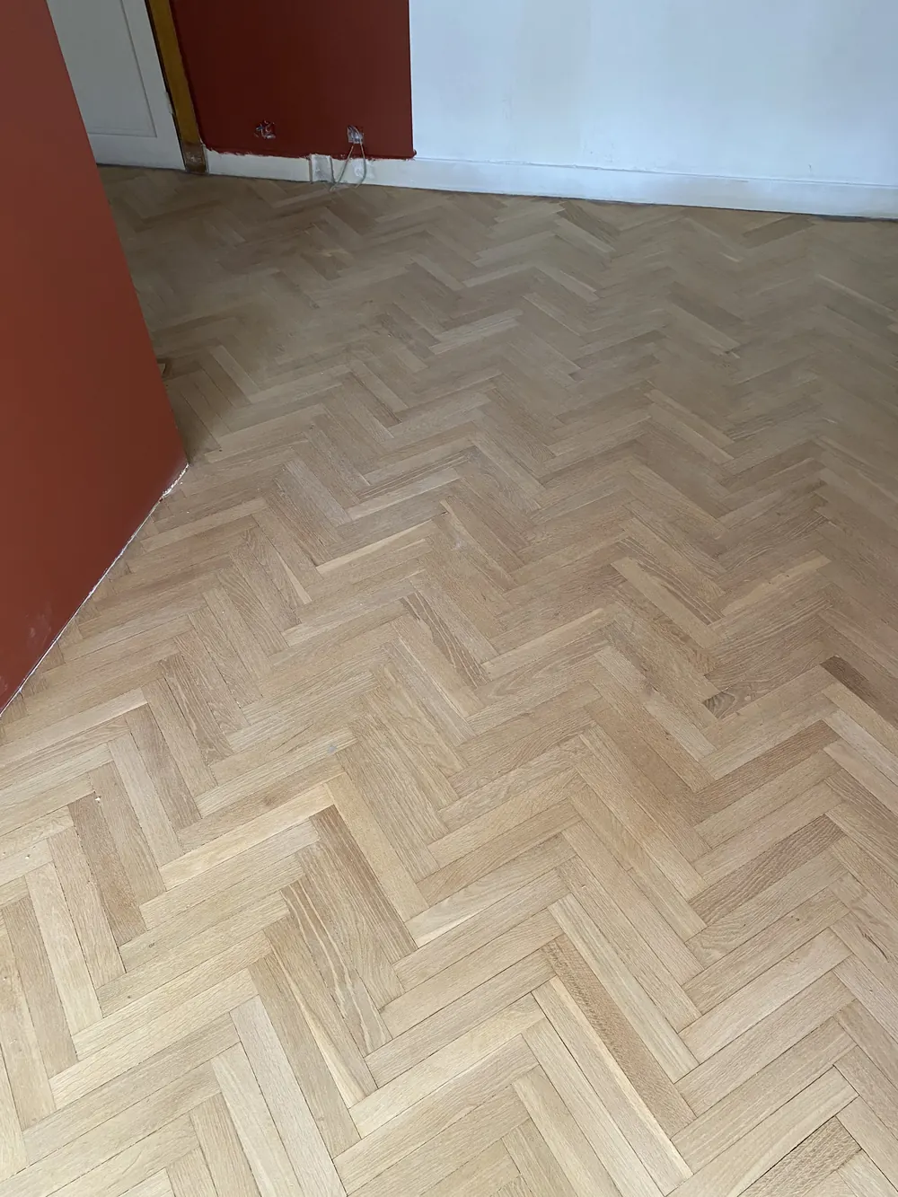 Parquet à bâton rompu rénové
